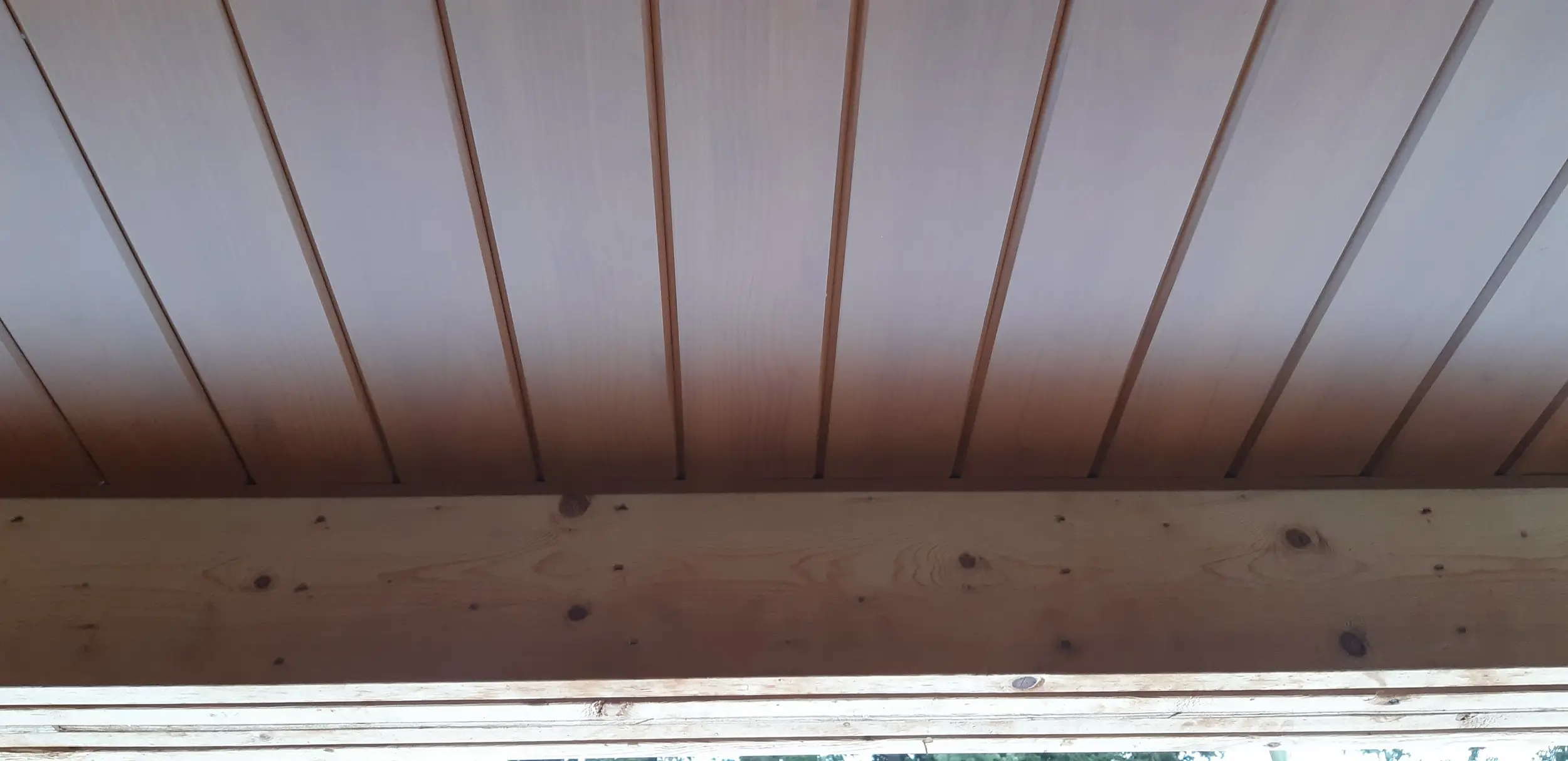 Underside of a roof overhang finished with AFX aluminum soffit