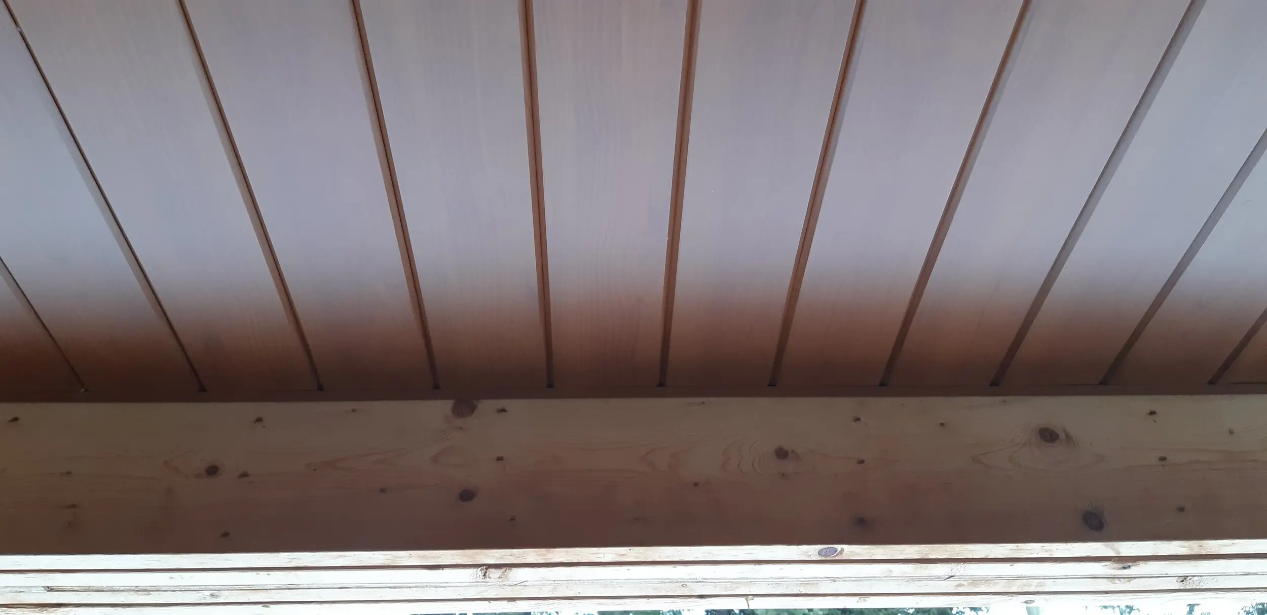 Underside of a roof overhang finished with AFX aluminum soffit