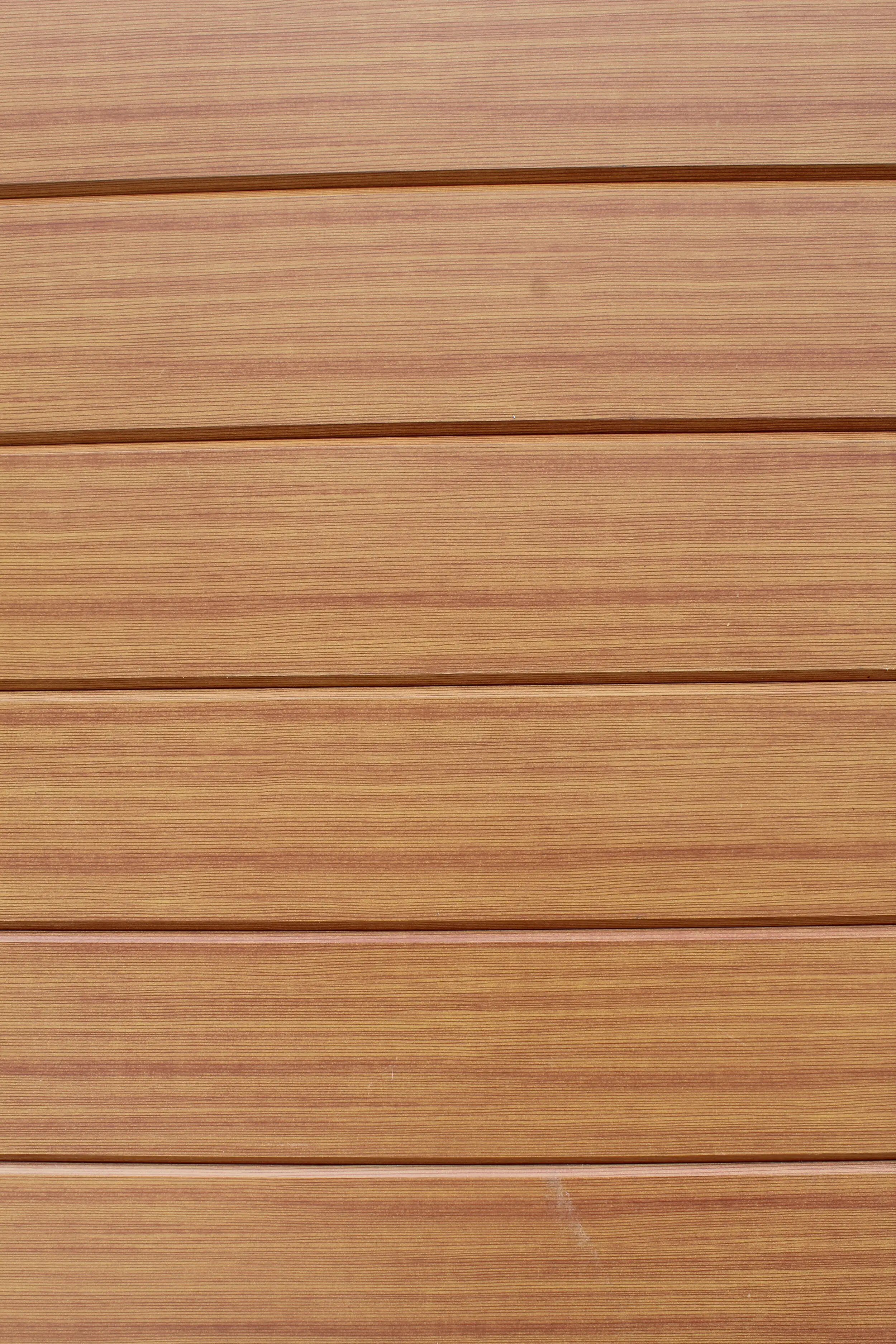 Close-up of AFX woodgrain aluminum panel texture